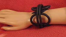 Load image into Gallery viewer, Black Rolled Rubber Oversized Geometric Shapes Magnetic Closure
