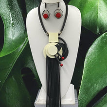 Load image into Gallery viewer, Necklace Rolled Rubber Geometric Center Piece
